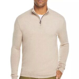 Half-zip sweater is crafted from luxurious cashmere.